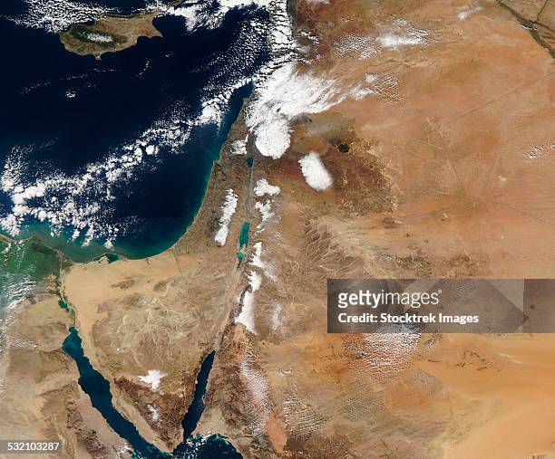 satellite view of a rare winter storm across much of the middle east. - egypt beach stock pictures, royalty-free photos & images