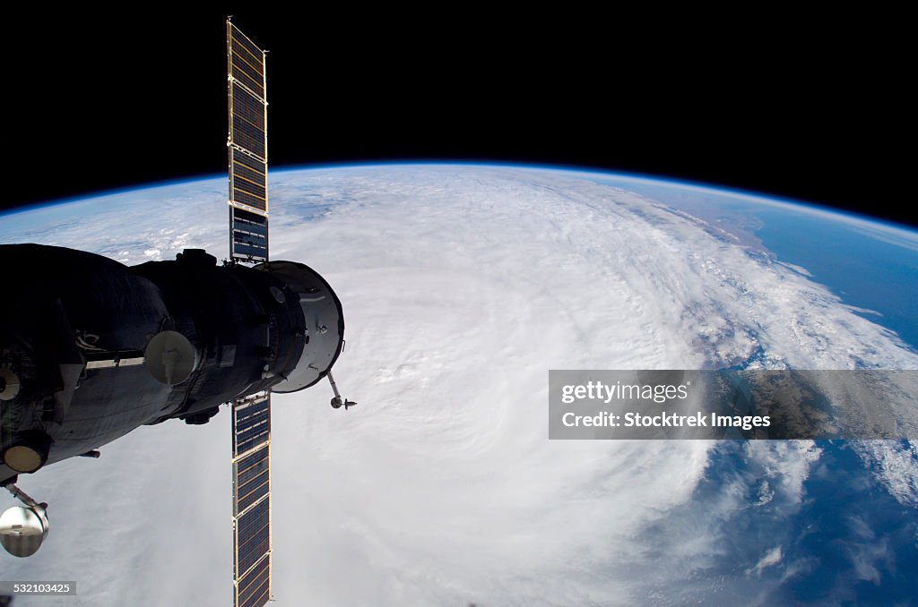 March 30, 2006 - Cyclone Glenda and a docked Soyuz spacecraft.