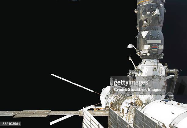 the johannes kepler automated transfer vehicle docks to the international space station. - international space station stock-fotos und bilder