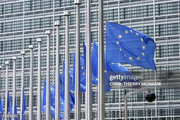 Flags in front of the European Commission Headquarters in Brussels are set at half mast in homage to the victims of the terrror attacks in London, 8...
