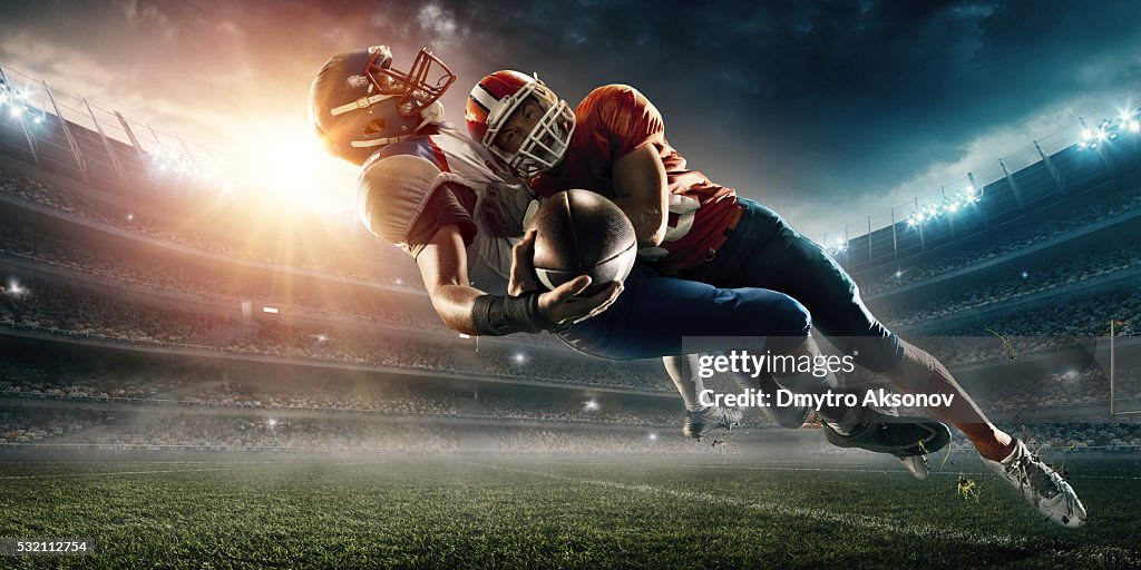 American football player being tackled