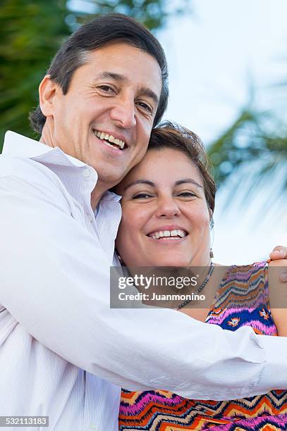 happy hispanic mature couple - puerto rican culture stock pictures, royalty-free photos & images