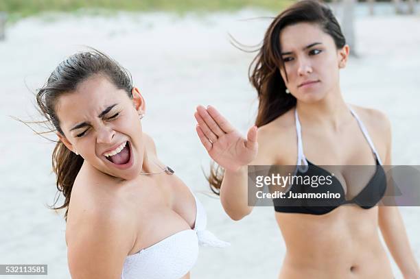 friends fighing - girl punching stock pictures, royalty-free photos & images