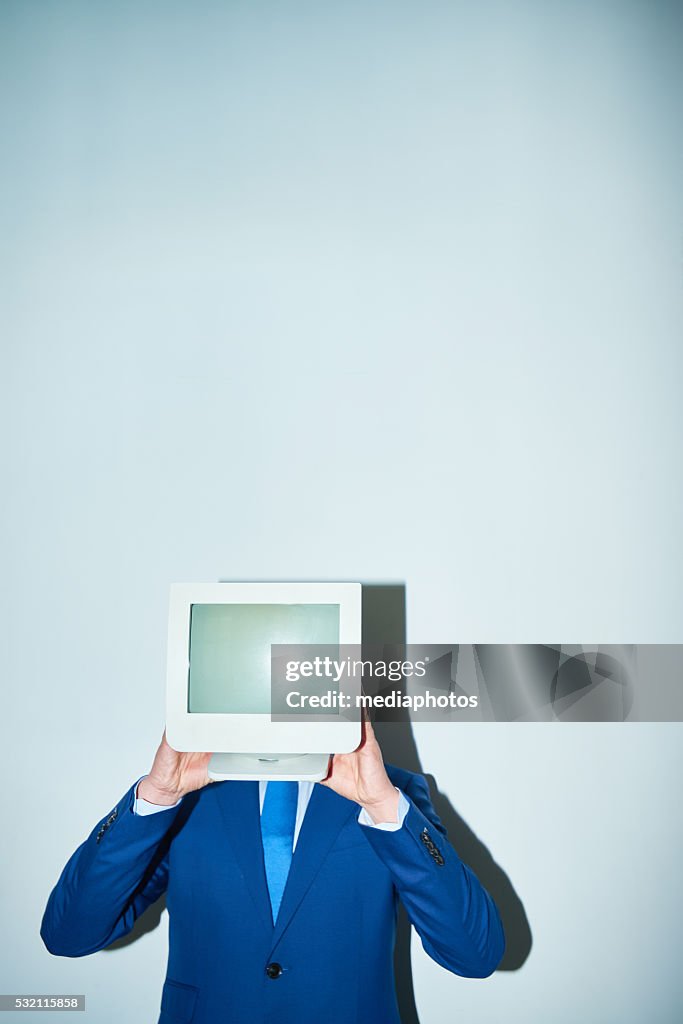 Man with computer monitor