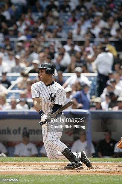 Derek Jeter of the New York Yankees bats during the game against the Tampa Bay Devil Rays at Yankee Stadium on June 22, 2005 in Bronx, New York. The...