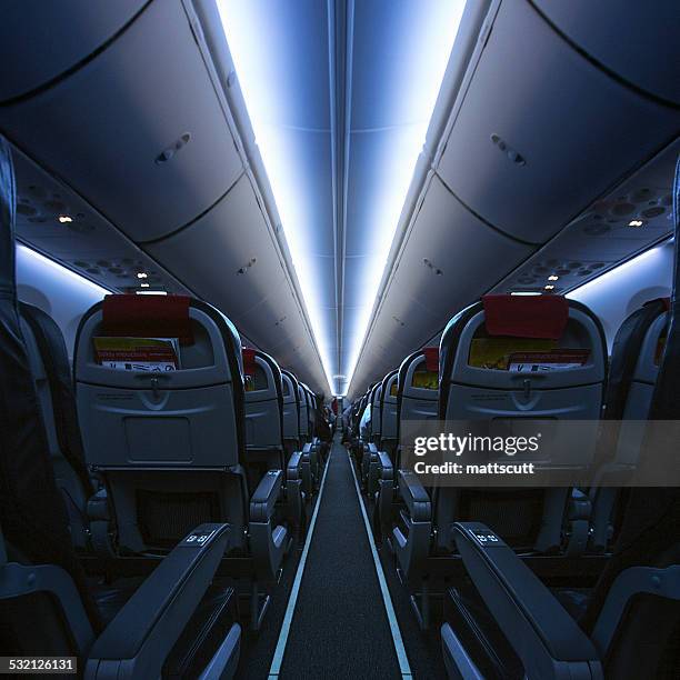 interior of an empty cabin on airplane - airplane interior stockfoto's en -beelden