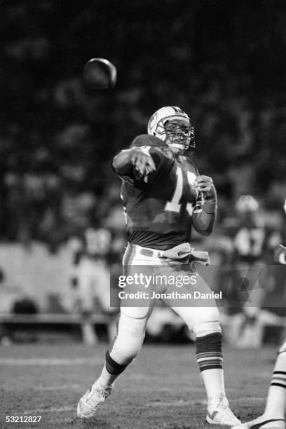 Dan Marino of the Miami Dolphins throws a pass against the Chicago Bears during the game at the Orange Bowl on December 2, 1985 in Miami, Florida....