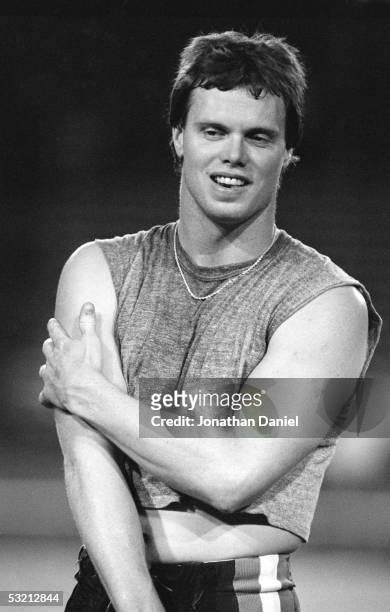 Jim McMahon of the Chicago Bears looks on during the game against the Miami Dolphins at the Orange Bowl on December 2, 1985 in Miami, Florida. The...