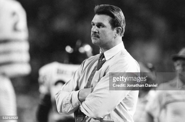 Head coach Mike Ditka of the Chicago Bears looks on during the game against the Miami Dolphins at the Orange Bowl on December 2, 1985 in Miami,...