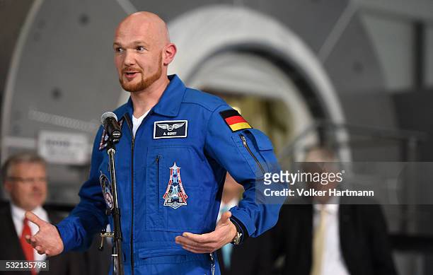 The german astronaut Alexander Gerst speeks in the astronauts training hall during a visit by German Chancellor Angela Merkel at the European...