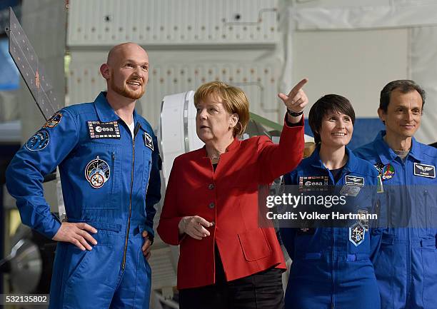 Astronaut Alexander Gerst, German Chancellor Angela Merkel ,astronaut Samantha Cristoforetti and astronaut Pedro Duque talk in the astronauts...