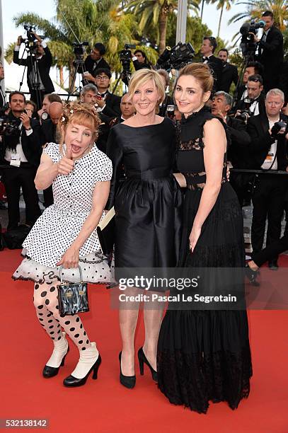 Actress Julie Depardieu, a guest and actress Julie Gayet attend "The Unknown Girl " Premiere during the 69th annual Cannes Film Festival at the...