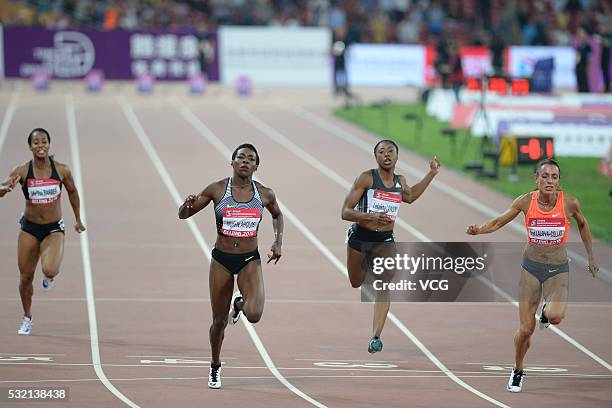 Me'Lisa Barber of the United States, Murielle Ahoure of Cote, Lekeisha Lawson of the United States and Ivet Lalova-Collio of Bulgaria compete in the...