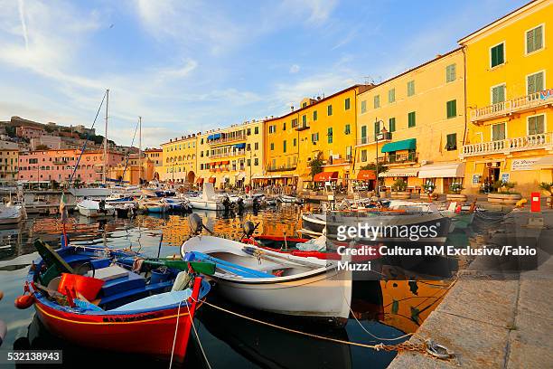 fishermens boats, portoferraio village, isle of elba, maremma, tuscany, italy - portoferraio stock pictures, royalty-free photos & images