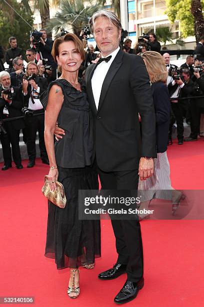 Mads Mikkelsen and Hanne Jacobsen attend "The Unknown Girl " Premiere during the 69th annual Cannes Film Festival at the Palais des Festivals on May...