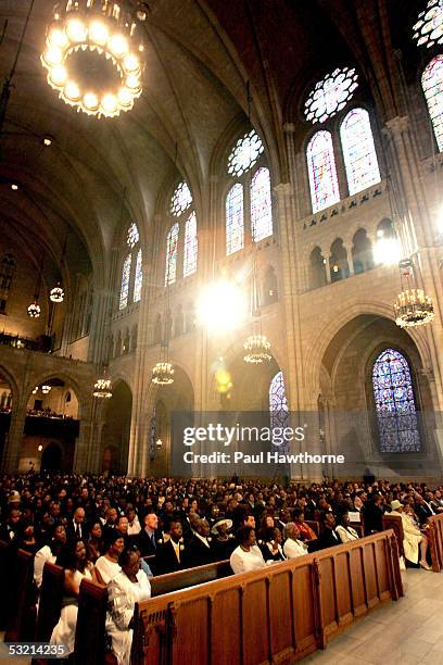 Family and friends of Luther Vandross attend his funeral at Riverside Church July 8, 2005 in New York City.