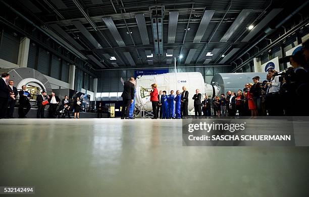 German Chancellor Angela Merkel visits the astronauts training hall of the European Astronauts Center of the European Space Ageny in Cologne, western...