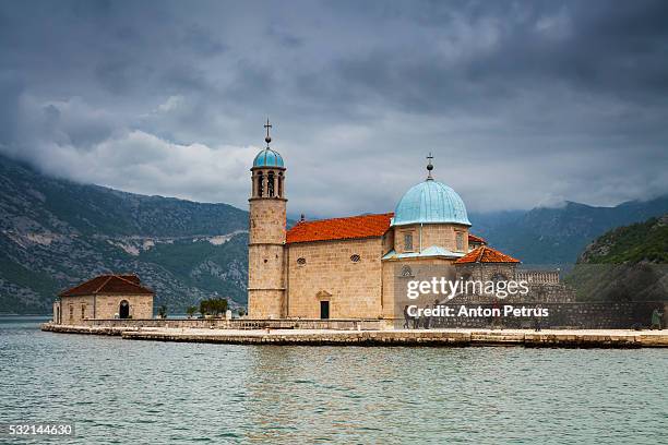 our lady of the rocks church (gospa od skrpjela) on bay of kotor in perast, montenegro - our lady of the rocks stock pictures, royalty-free photos & images