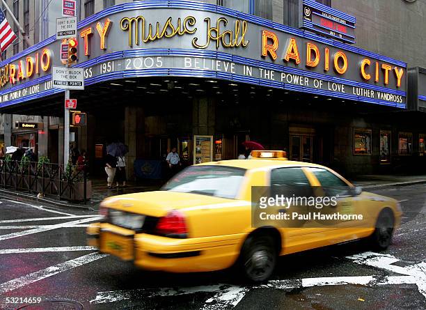 The marquee of Radio City Music Hall pays tribute to the late Luther Vandross on the morning of his funeral July 8, 2005 in New York City.