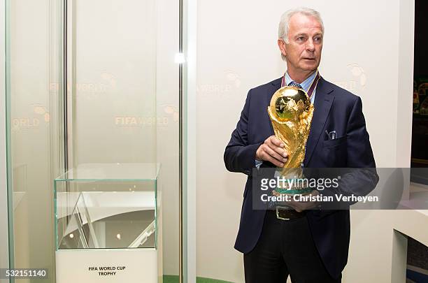 Vice President Rainer Bonhof of Borussia Moenchengladbach with the Fifa World Cup Trophy during he visit the Fifa Museum at day three of Borussia...