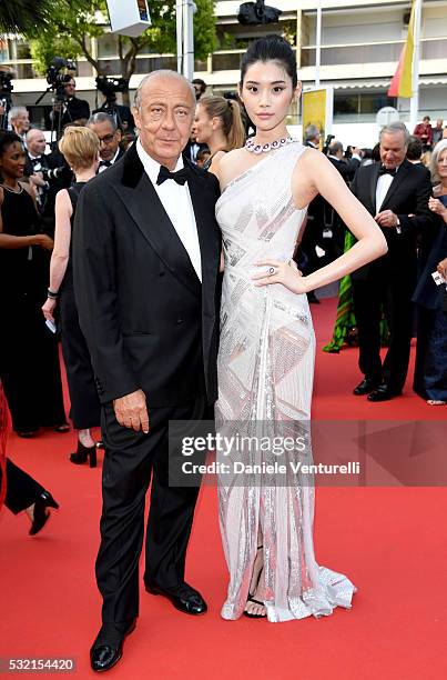 Fawaz Gruosi and Ming Xi attend "The Unknown Girl " Premiere during the 69th annual Cannes Film Festival at the Palais des Festivals on May 18, 2016...