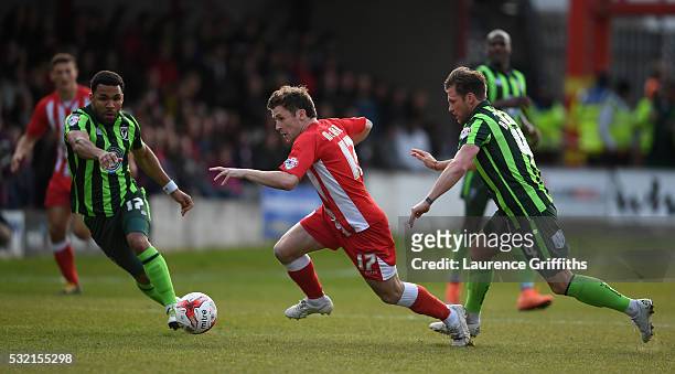 Shay McCartan of Accrington Stanley is closed down by Andy Barcham and Dannie Bulman of AFC Wimbledon during the Sky Bet League Two play off, Second...