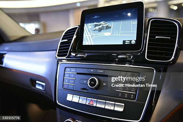 New instrument panel design on the dashboard with a semi-integrated media display, a modified centre console with touchpad and panoramic sunroof of...