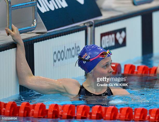 Britain's Hannah Miley looks back at the scoreboard after her win in the semi-final of the women's 200m Individual medley swimming event on Day 10 of...