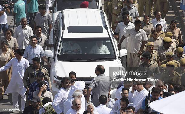 Savinder Kaur, wife of Sant Nirankari Mission Head Baba Hardev Singh Ji Maharaj, joins his funeral procession as it proceeded towards the Nigam Bodh...