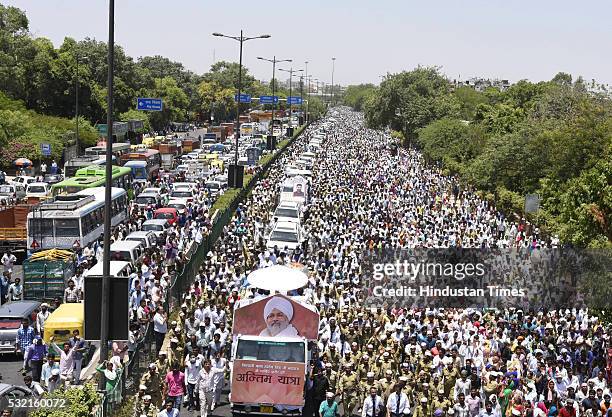 Thousands of devotees join the funeral procession of Sant Nirankari Mission Head Baba Hardev Singh Ji Maharaj and his son-in-law Avneet Setya at...