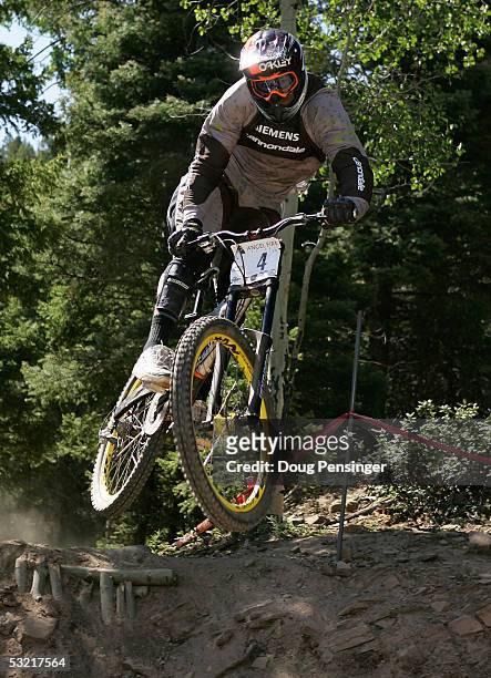 Cedric Garcia of France rides during the semi finals of the Downhill Event at the UCI Mountain Bike World Cup July 9, 2005 at the Angel Fire Resort...