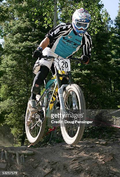 Jared Graves of Australia rides during the semi finals of the Men's Downhill Event at the UCI Mountain Bike World Cup July 9, 2005 at the Angel Fire...