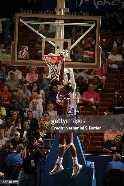 Lisa Leslie of the Western Conference All-Stars dunks against the Eastern Conference All-Stars during the 2005 WNBA All-Star Game on July 9, 2005 at...