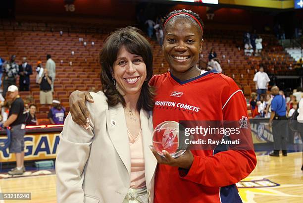 President Donna Orender poses with All-Star MVP Sheryl Swoopes after playing in the 2005 WNBA All-Star Game on July 9, 2005 at the Mohegan Sun Arena...