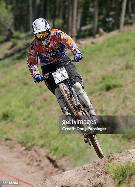 Tracy Moseley of Great Britain rides during the finals as she finsihed third in the Women's Downhill Event at the UCI Mountain Bike World Cup on July...