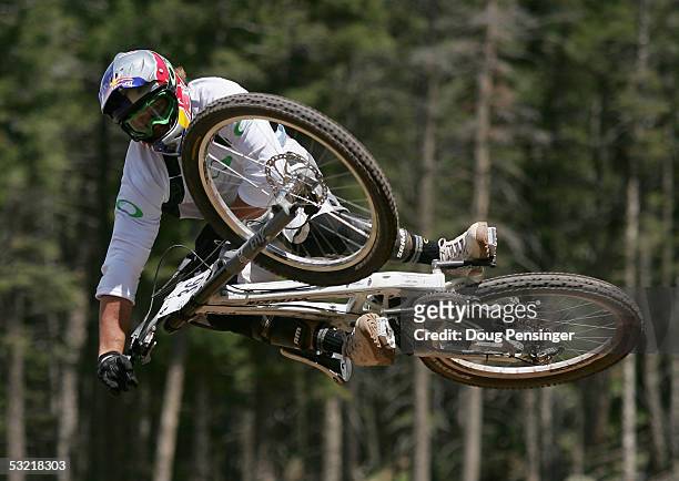 Kyle Strait of the USA goes airborne with style during the finals as he finished 21st in the Men's Downhill Event at the UCI Mountain Bike World Cup...