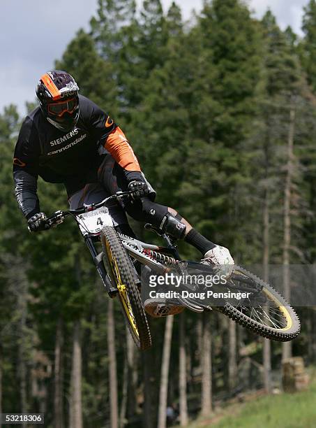 Cedric Gracia of France rides during the finals as he finsihed fourth in the Men's Downhill Event at the UCI Mountain Bike World Cup on July 9, 2005...