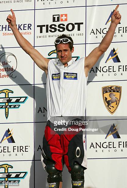 Brian Lopes of the USA takes the podium with the point leader jersey after winning the Men's 4 Cross at the UCI Mountain Bike World Cup at the Angel...