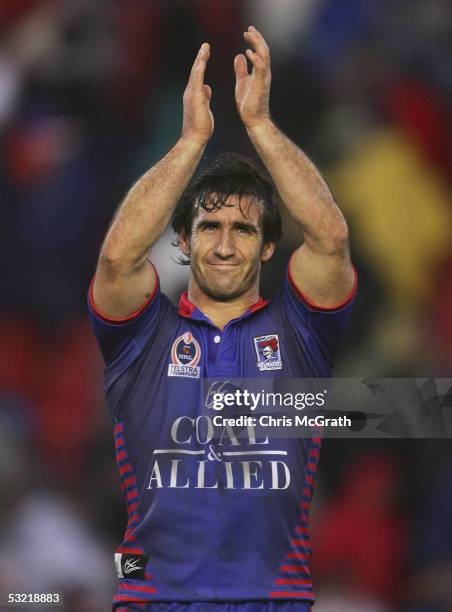 Andrew Johns of the Knights celebrates victory during the round 18 NRL match between the Newcastle Knights and the North Queensland Cowboys held at...