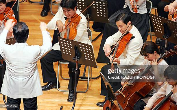 Japanese Crown Prince Naruhito plays viola as he and fellow Gakushuin University graduates perform "Lohengrin" Vorspiel 1 Aufzug by German composer...