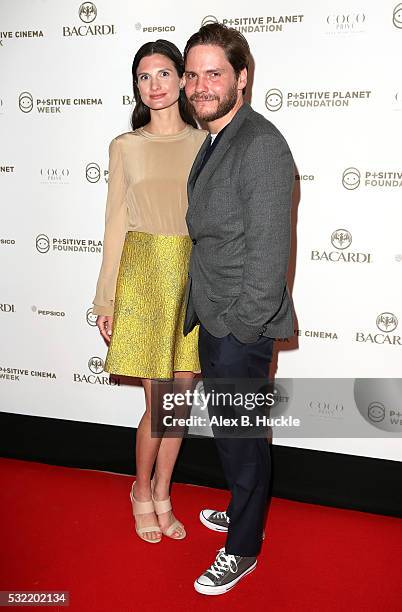 Felicitas Rombold and actor Daniel Bruehl attend the Planet Finance Foundation Gala Dinner during the 69th annual Cannes Film Festival at Hotel...