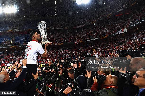 Team captain Jose Antonio Reyes of Sevilla poses for photograhs with the trophy after the UEFA Europa League Final match between Liverpool and...