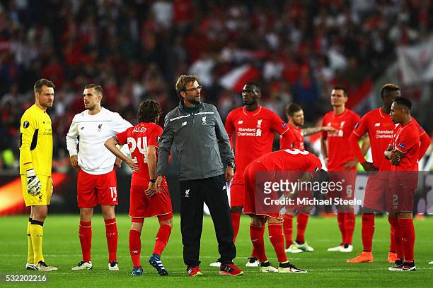 Jurgen Klopp, manager of Liverpool and players look on at the award ceremoy after the UEFA Europa League Final match between Liverpool and Sevilla at...