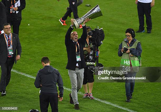 Ramon Rodriguez Verdejo, director of football of Sevilla lifts the trophy after the UEFA Europa League Final match between Liverpool and Sevilla at...