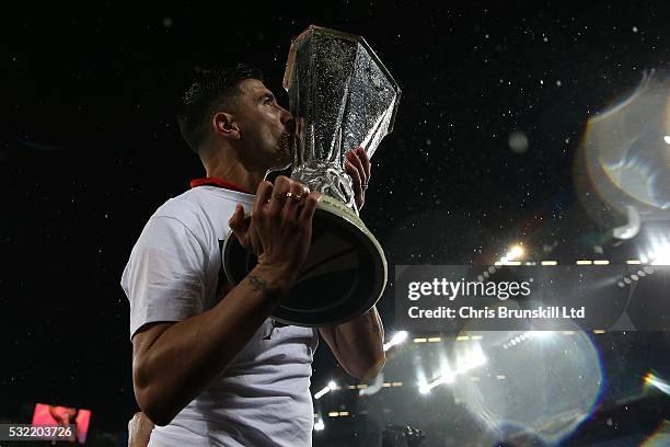 Jose Antonio Reyes of Sevilla kisses the trophy following the UEFA Europa League Final match between Liverpool and Sevilla at St. Jakob-Park on May...