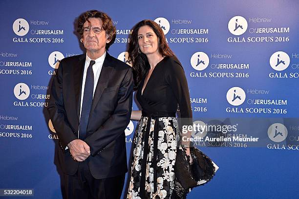 Luc Ferry and Marie-Caroline Becq de Fouquieres attend the Scopus gala photocall at Pavillon Vendome on May 18, 2016 in Paris, France.