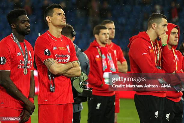 Dejan Lovren and Kolo Toure of Liverpool look dejected at the end of the UEFA Europa League Final between Liverpool and Sevilla at St. Jakob-Park on...