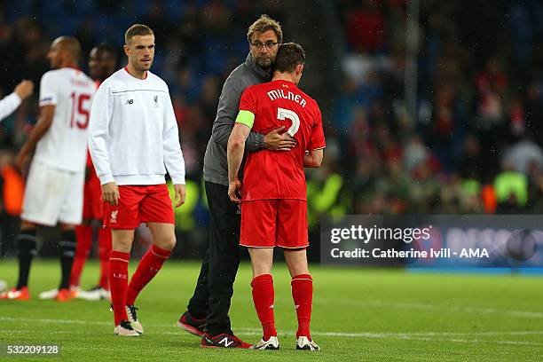 Liverpool Manager / Head Coach Jurgen consoles James Milner at the end of the UEFA Europa League Final between Liverpool and Sevilla at St....
