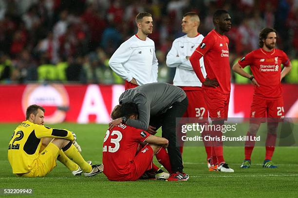 Liverpool manager Jurgen Klopp consoles Emre Can following the UEFA Europa League Final match between Liverpool and Sevilla at St. Jakob-Park on May...