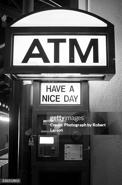 polite atm machine - kapitalismus stock-fotos und bilder